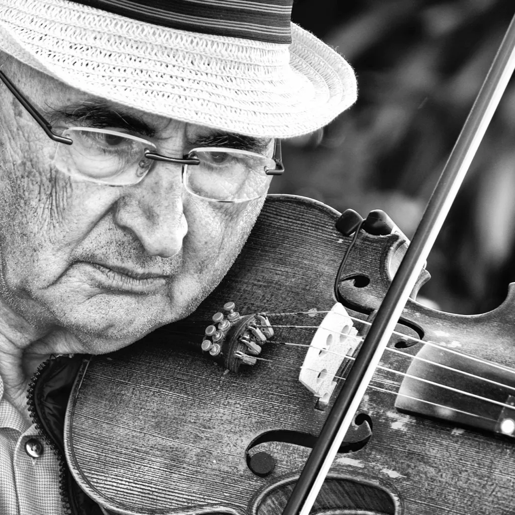 A man playing a violin.