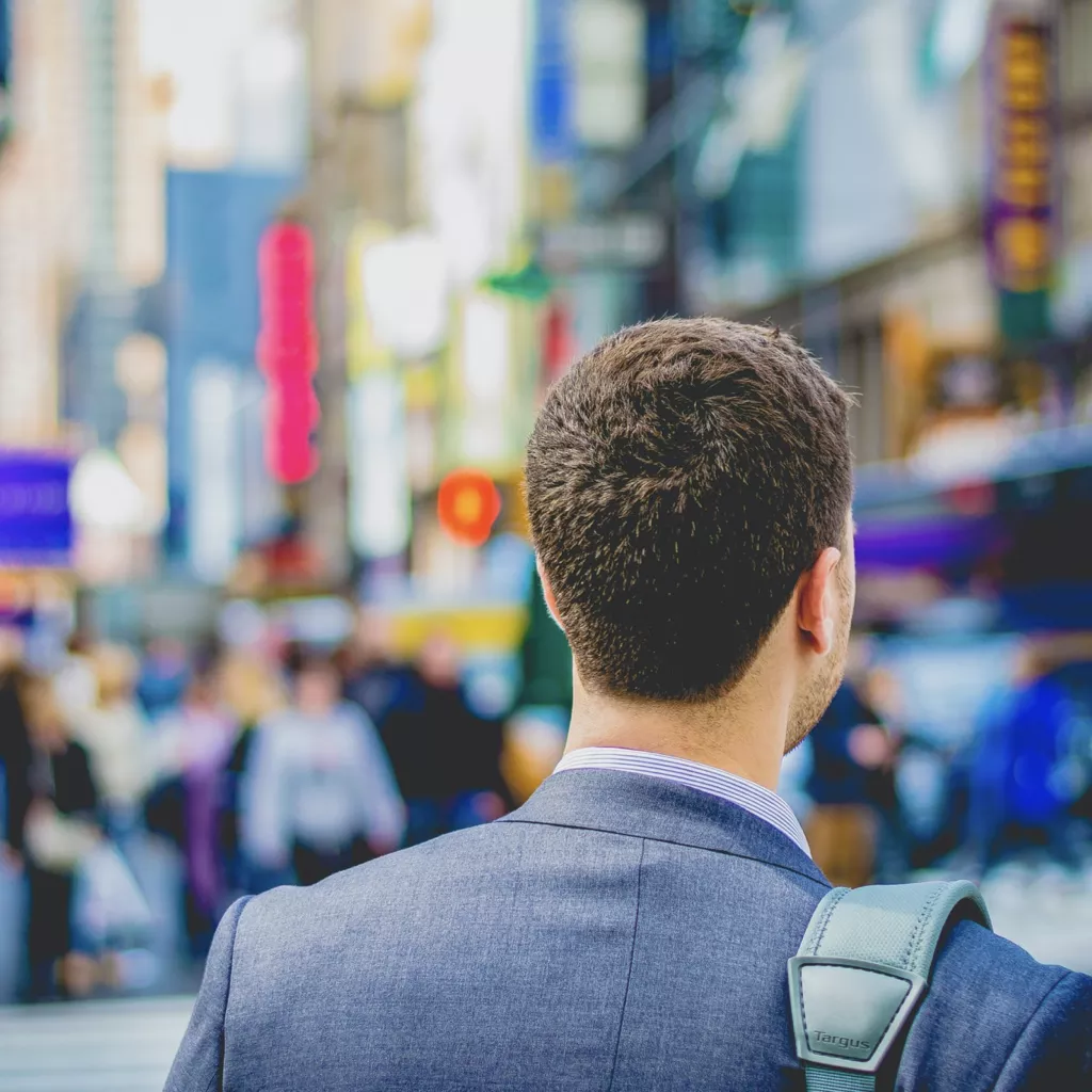 A man in a suit heading to work.