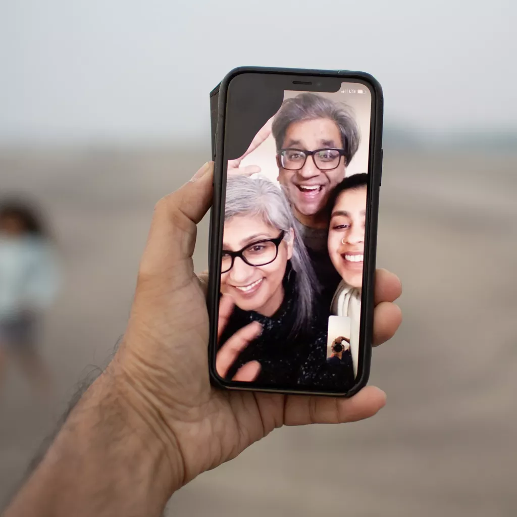 Family in the middle of a video call.