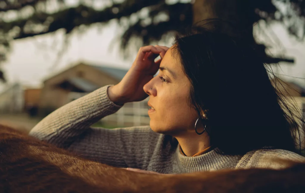 A lady considering the life lessons she can share with her family. 