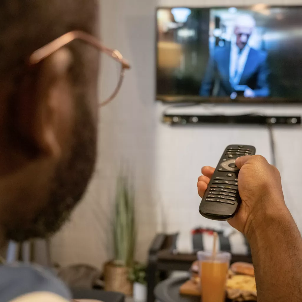 Man watching TV.