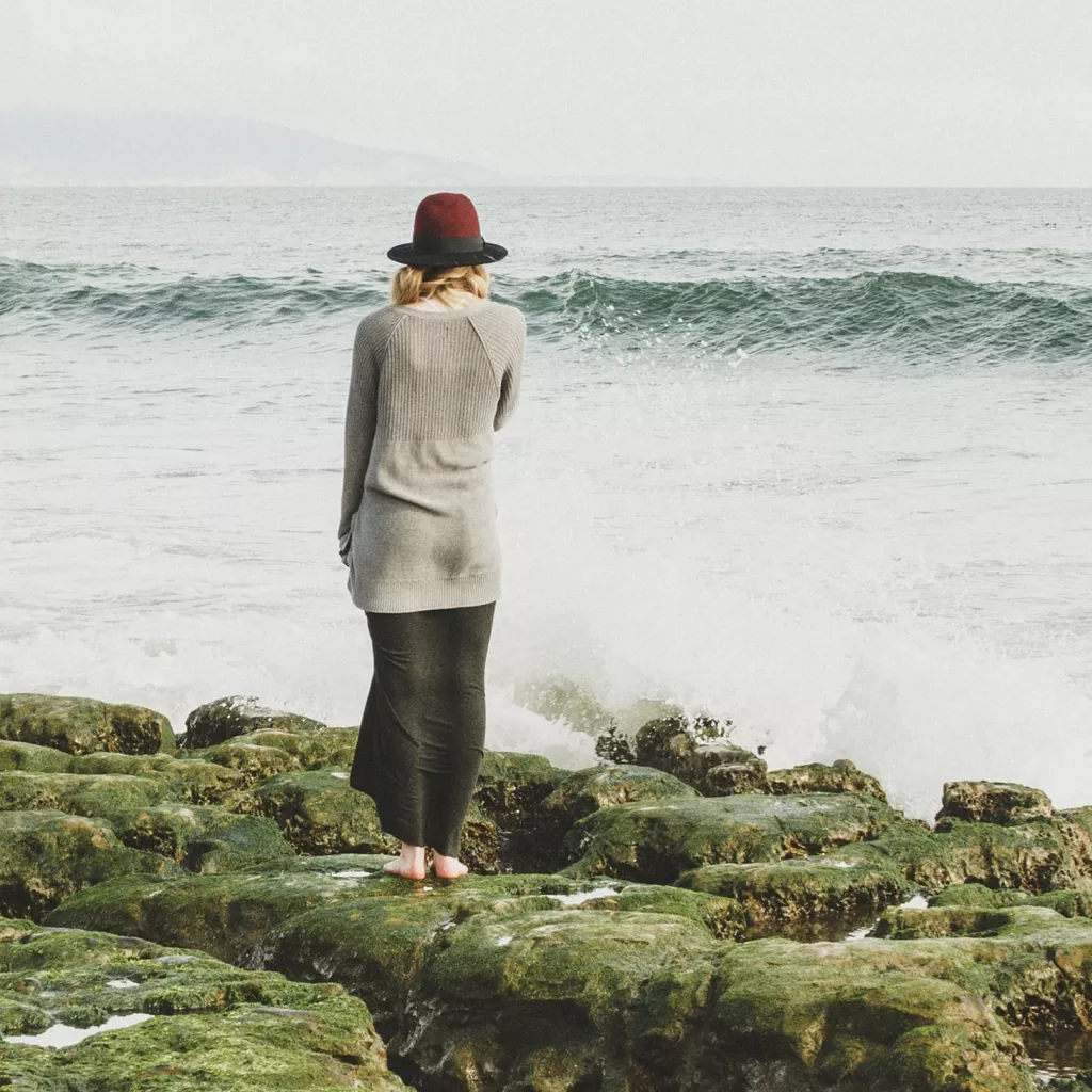 A lady looking out to sea.