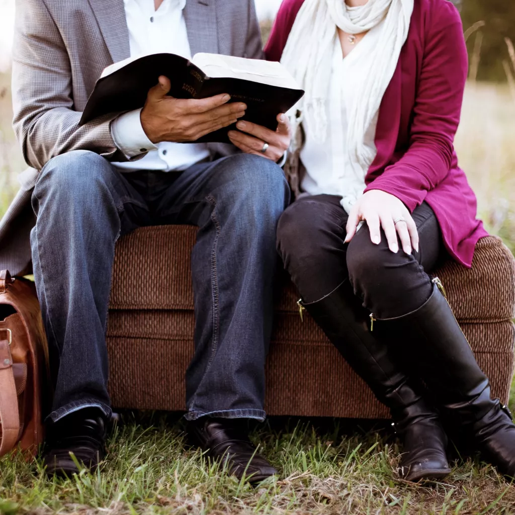 An open book being read.