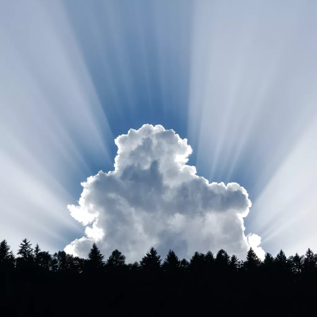 The sun's rays passing a cloud.