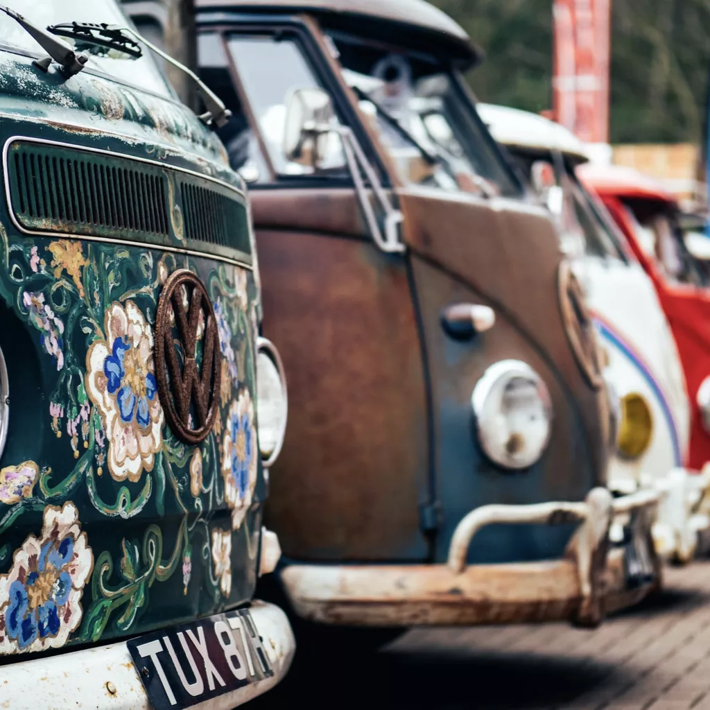 A collection of iconic old vehicles.