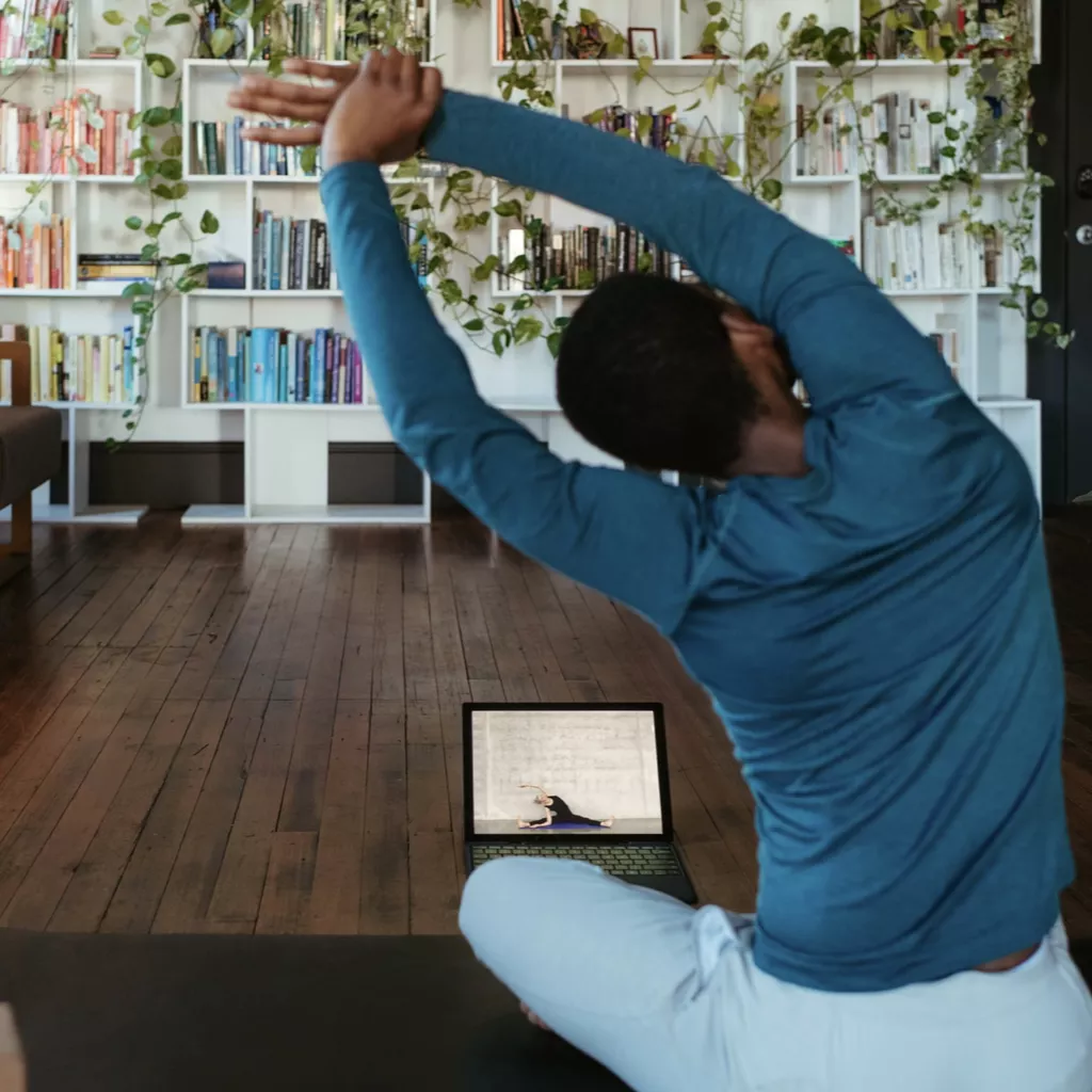 A lady doing yoga.