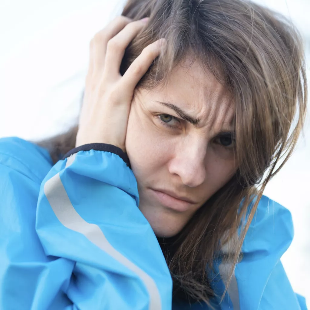 A lady looking upset.