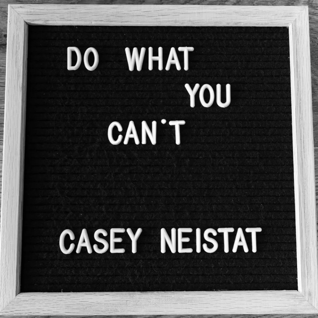 A sign saying: "Do what you can't".