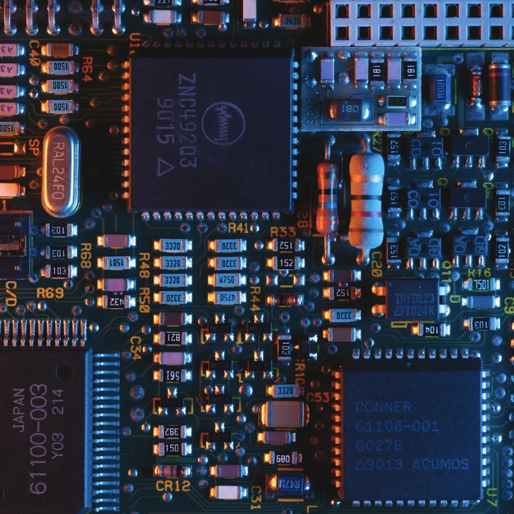 A computer board showing chips and electronics in general.