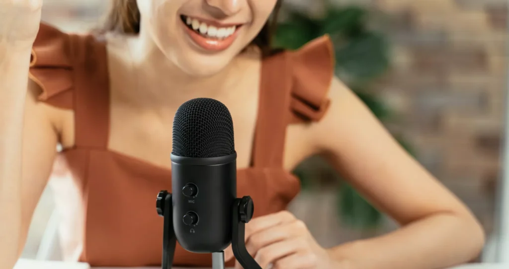 A lady voice recording memories into a microphone.